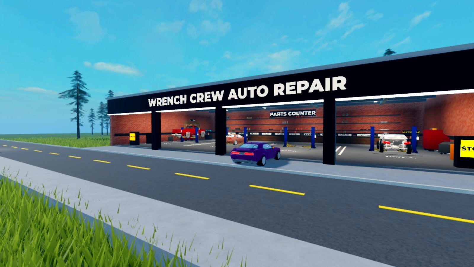 The Wrench Crew garage from the road: four lift bays and a parts counter